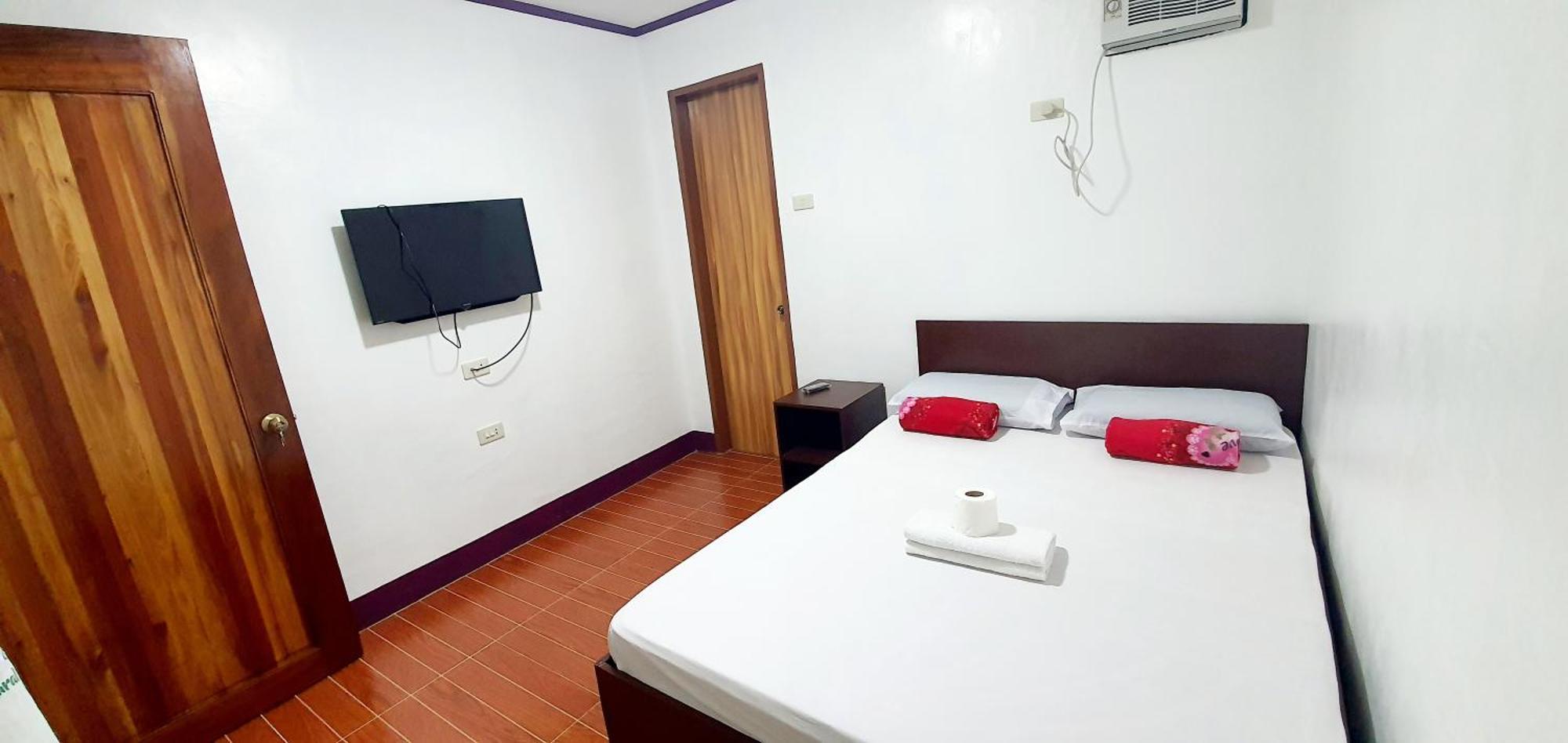 Sj Pabua Travellers Inn Мамбаджао Екстериор снимка
